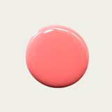 a drop large drop of the polish to show it’s color. It’s a salmon peachy tone with a base colour of pink. 