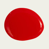 ￼ Drop of nail polish to show colour which is a bright primary red
