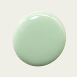 A drop of the nail polish to show colour which is a very light minty green