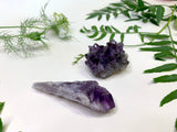 One amethyst wand showing a long pointed Crystal point unpolished fully natural