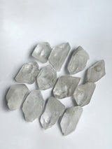 Detail shot of raw quartz points showing light reflecting qualities