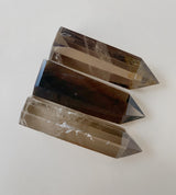 Close-up shot of smoky quartz showing deep warm gray tones