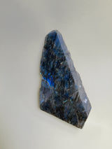 Close-up shot of this labradorite slab that shows intense Rich deep blue colours and flashes of silver and gold