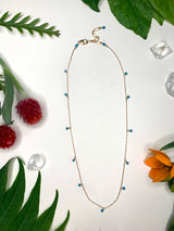 Gold choker with small turquoise beads