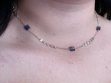 Stone in sequin necklace rose silver sequin chain segments and square blue kyanite beads