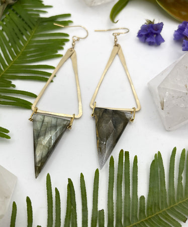 Triangle stone drop earrings on white background hammered medal triangle with triangle fascinator labradorite hanging off the end￼