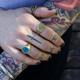 woman with tattoos wearing waylon ring